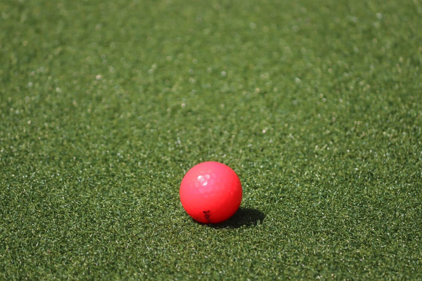 a golf ball on an artificial turf installed in Fernandina Beach FL