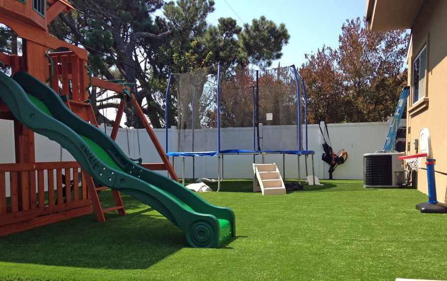 playground in Neptune Beach FL made out of artificial turf  with complete playset installed